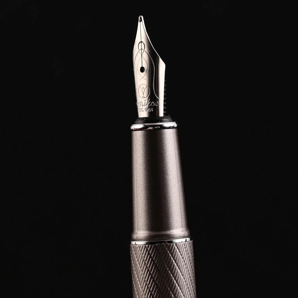 Scrikss Noble 35 Medium nib Fountain Pen Nib in Matte Titanium on a black background
